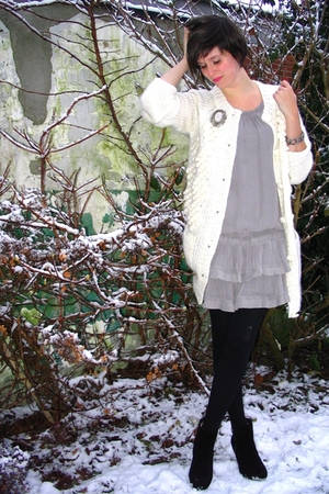 White Sweater Dress on Gray Dress White Sweater Silver Accessories Black Boots Black