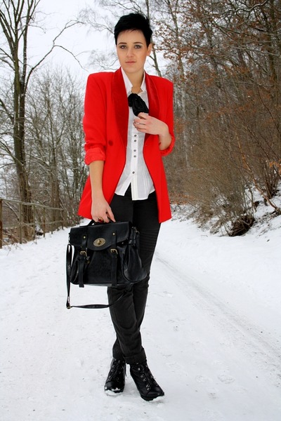 red blazer and black pants