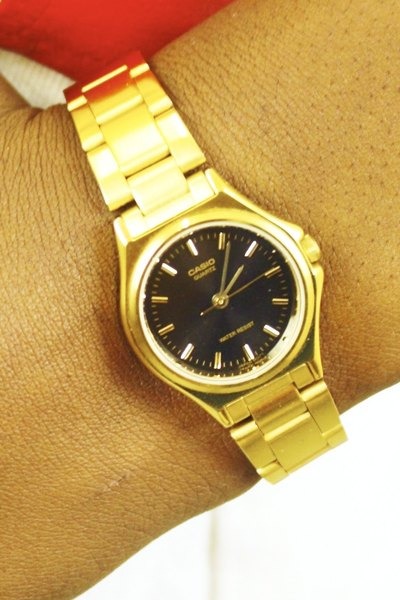 casio gold watch black face