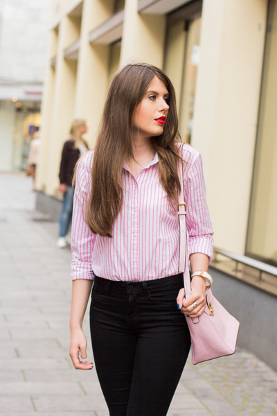 pink top black jeans