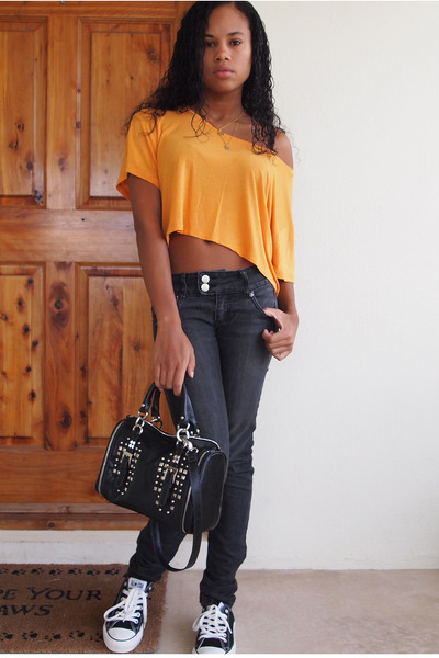 mustard top black jeans
