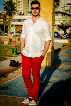 red shirt with white pants