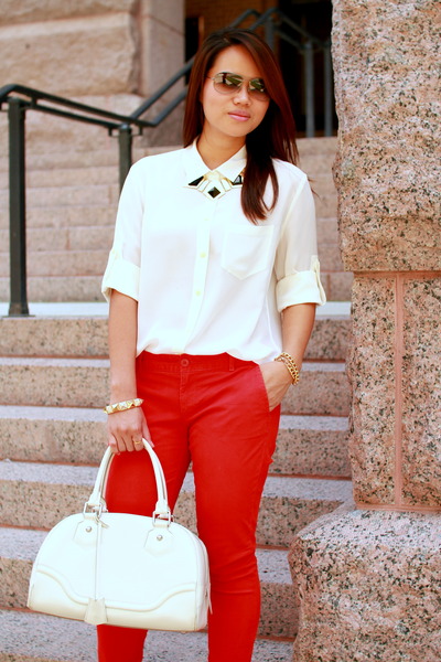 red blouse and white pants