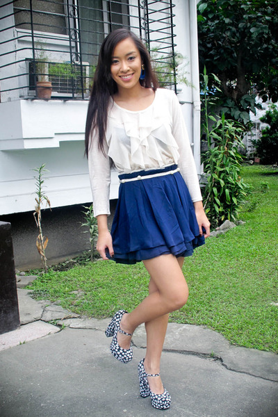 blue skirt and white top