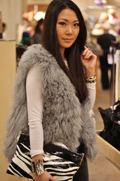 fur vest with jeans