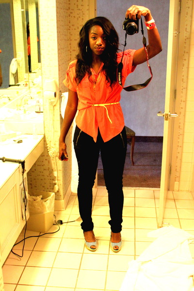 black jeans orange shirt